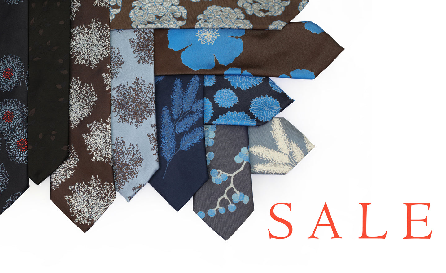 Assortment of blue and brown silk Mimi Fong ties for sale on white background