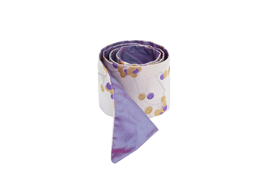 Rolled white & purple silk Mimi Fong skinny scarf with berries pattern on white background