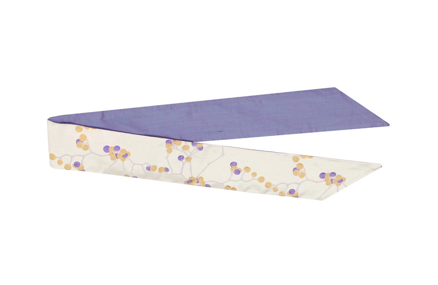 Folded flat white & purple silk Mimi Fong skinny scarf with berries pattern on white background
