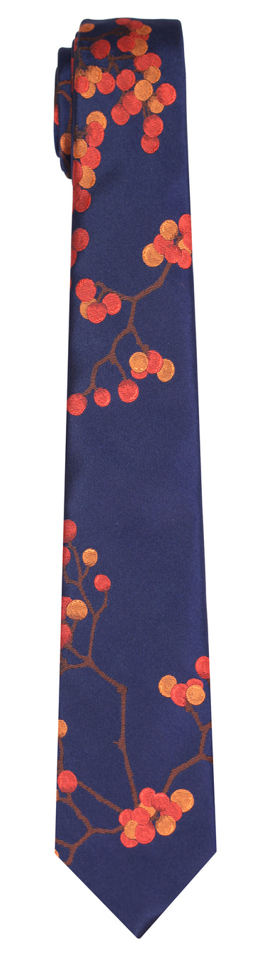 A navy silk Mimi Fong tie with all over berries pattern in hues of orange against a white background